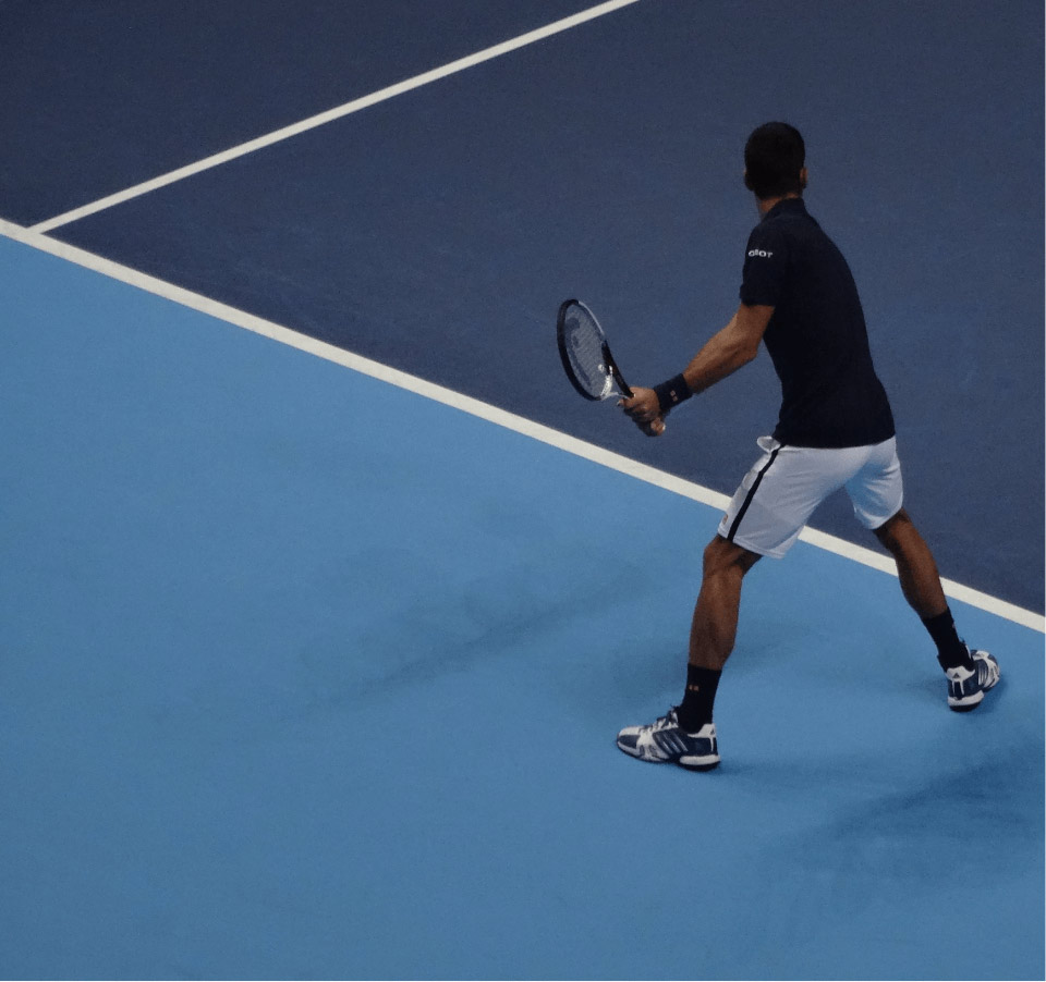 Djokovic prepping for a backhand